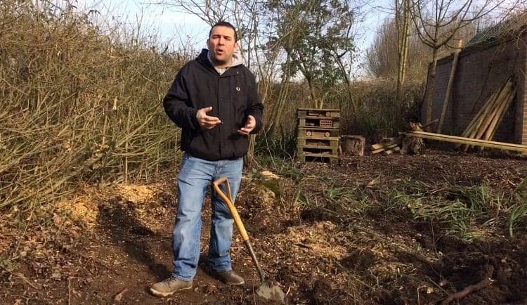 Man Making Garden Pond