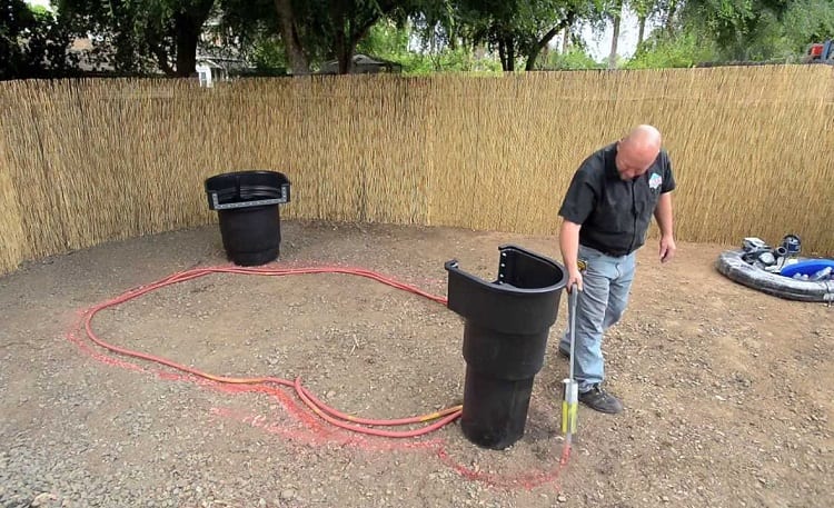 Taking Measurements For Garden Pond